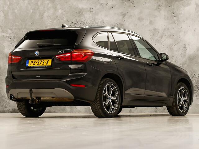 BMW X1 sDrive18i Sport High Executive 140Pk Automaat (PANORAMADAK, GROOT NAVI, MEMORY SEAT, LEDER, CAMERA, SPORTSTOELEN, TREKHAAK, STOELVERWARMING, NIEUWSTAAT)