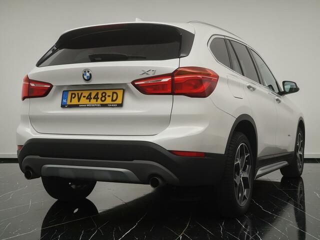 BMW X1 sDrive20i Centennial High Executive Automaat 192PK - Lederen bekleding - Panoramadak - Stoelverwarming - 18 inch LM velgen - 12 maanden garantie