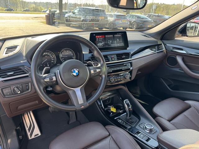 BMW X2 sDrive20i High Exe. M Sport / Trekhaak / Panoramadak / Camera / Head-up / Leder / 20'' / DAB / Navigatie / Stoelverwarming / Cruise Control