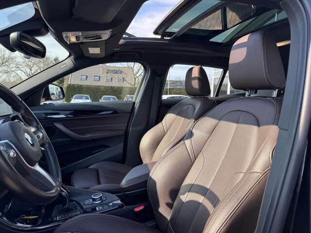BMW X2 sDrive20i High Exe. M Sport / Trekhaak / Panoramadak / Camera / Head-up / Leder / 20'' / DAB / Navigatie / Stoelverwarming / Cruise Control