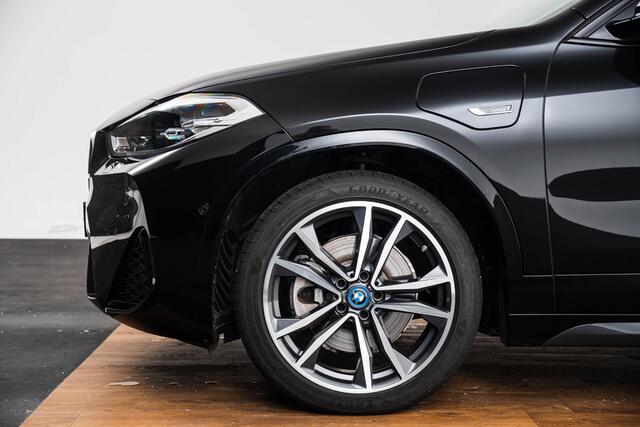 BMW X2 xDrive25e High Executive M Sport - panoramadak - Park/driving Assistant - Head Up - HiFi - Comfort Access - Stuurwielrand verwarmd - Verwarmde voorstoelen - Armsteun voor - Koplampsproeiers - PDC Voor/Achter - Navigatiesysteem Plus -