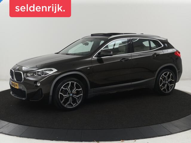 BMW X2 sDrive20i High Executive | Panoramadak | Leder | Stoelverwarming | Cruise control | Head-up | Bluetooth | Sfeerverlichting | Park assist | Elektrische achterklep | Trekhaak