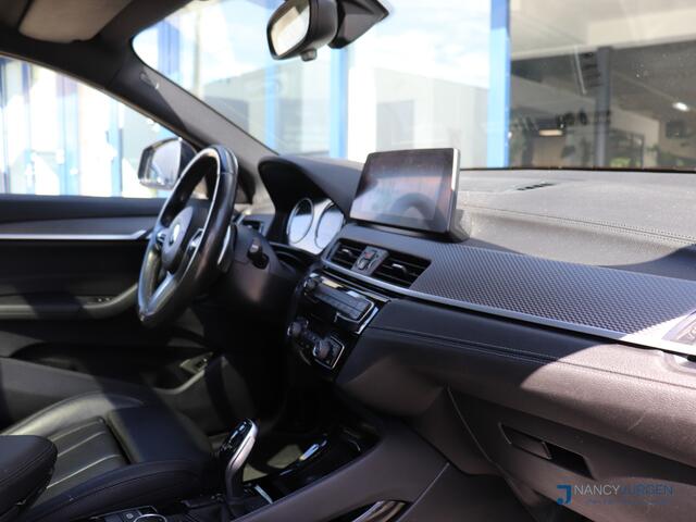 BMW X2 sDrive20i High Executive Edition | M-Pakket | Cruise Control met Remfunctie | Pano | Stoelverwarming | Leer | Elek. Kofferklep | Draadloos Opladen | Privacy Glas | Navi | HiFi-Audio | LED | DAB | Performance Control | M Sport-Chassis
