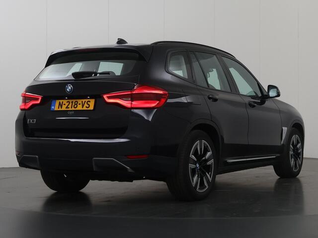 BMW X3 iX3 Executive 80 kWh | Elektrisch verstelbare stoelen + geheugen | Digitaal Dashboard | Camera | Apple CarPlay | Navigatie | Stoelverwarming | Standkachel | Panoramadak | Adaptieve Cruise Control | Trekhaak |