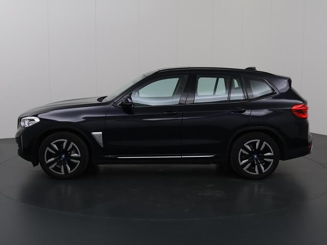 BMW X3 iX3 Executive 80 kWh | Elektrisch verstelbare stoelen + geheugen | Digitaal Dashboard | Camera | Apple CarPlay | Navigatie | Stoelverwarming | Standkachel | Panoramadak | Adaptieve Cruise Control | Trekhaak |