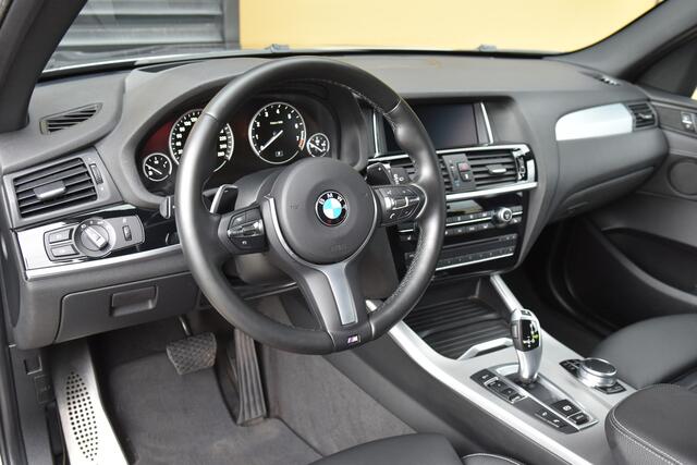 BMW X3 sDrive20i Centennial High Executive * M-Pakket * Camera * Head-up * Panoramadak *