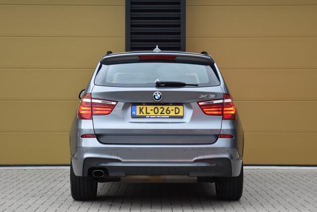 BMW X3 sDrive20i Centennial High Executive * M-Pakket * Camera * Head-up * Panoramadak *