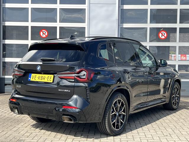 BMW X3 xDrive30e | Navigatie/Android/Apple Carplay | LM Velgen 19" | Elektrisch Glazen Panoramadak | Voorstoelen Verwarmd | Rondomzicht Camera |