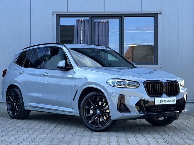 BMW X3 xDrive30e M sport 292 PK | Elek stoelen | Carbon | Laser | Keyless | Brooklyn grau metallic