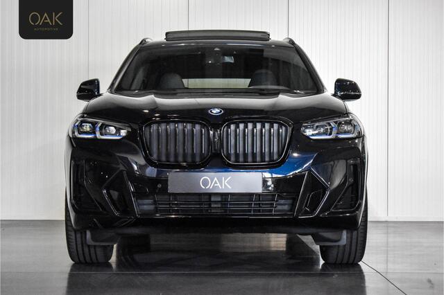 BMW X3 xDrive30e | M-Sport | Live Cockpit | Panorama | M-Stoelen | Memory | Head-Up | Trekhaak | 20"LM | Carbon Zwart