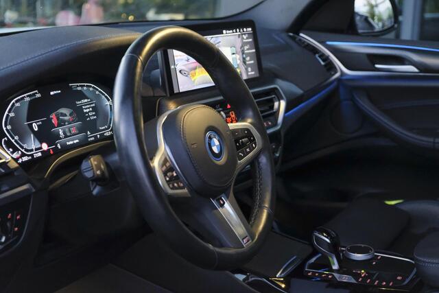 BMW X3 xDrive30e 292pk LCI M-sport Panoramadak X3M stoelen Brooklyn grau Trekhaak Adaptive cruise NLauto