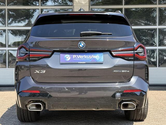 BMW X3 xDrive30e M SPORT | SPORTREMMEN ROOD | PANORAMA | TREKHAAK | ADAPTIEF ONDERSTEL | CAMERA | KEYLESS |
