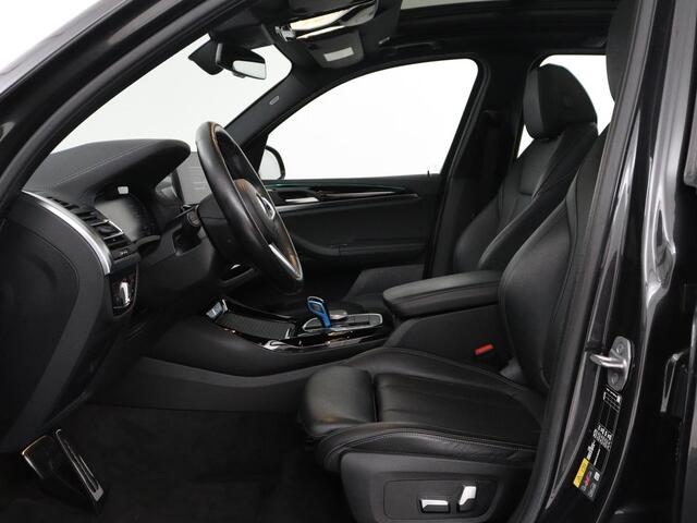 BMW X3 iX3 Executive 80 kWh | SOH 93,8% | Panoramadak | Leder | Stoelverwarming | Adaptive cruise | Carplay | Sfeerverlichting | Camera | Park assist | Elektrische achterklep | PHEV