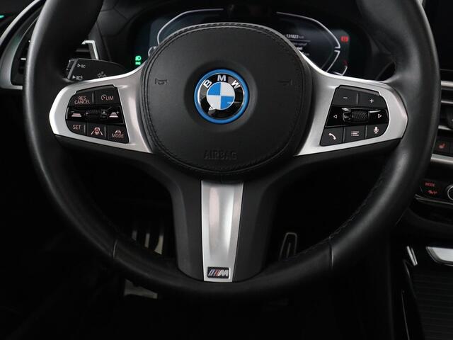 BMW X3 iX3 Executive 80 kWh | SOH 93,8% | Panoramadak | Leder | Stoelverwarming | Adaptive cruise | Carplay | Sfeerverlichting | Camera | Park assist | Elektrische achterklep | PHEV