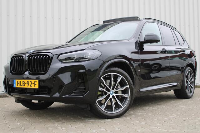 BMW X3 xDrive30e High Executive M-Sport | Incl. 12 maanden Garantie | SoH 96% | Panorama dak | Harman/Kardon Audiosysteem | Head-Up Display | Elektrisch verstelbare stoelen met memory | Adaptive cruise | 360° Camera | Elektrische kofferbakklep | Dodehoekdetectie | Stoelverwarming | Keyless entry/start | Navigatie | Parkeersensoren V+A | Apple CarPlay/Android Auto | Climate controle | Draadloze telefoonlader |