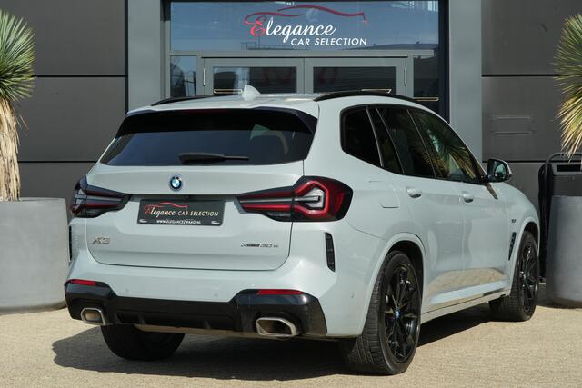 BMW X3 xDrive30e M Sport High Executive | 292 PK | PHEV | PANO | 360° Camera | Leder BMW X3 xDrive30e M Sport High Executive 292 PK Plug-in Hybrid met 2.0 viercilinder benzinemotor en automatische 8-traps transmissie, voorzien van elektrisch panoramadak, lederen bekleding, 36