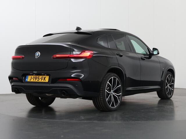 BMW X4 xDrive20i High Executive Edition | M-Sport | Navigatie | Parkeercamera | Stoel/stuurverwarming | Adaptieve Cruise Control | Harman/Kardon | HUD | Ele. verstelbare stoelen + Geheugen | Adaptief Onderstel | Panoramadak |