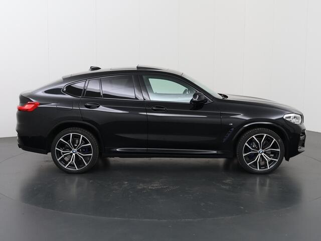 BMW X4 xDrive20i High Executive Edition | M-Sport | Navigatie | Parkeercamera | Stoel/stuurverwarming | Adaptieve Cruise Control | Harman/Kardon | HUD | Ele. verstelbare stoelen + Geheugen | Adaptief Onderstel | Panoramadak |