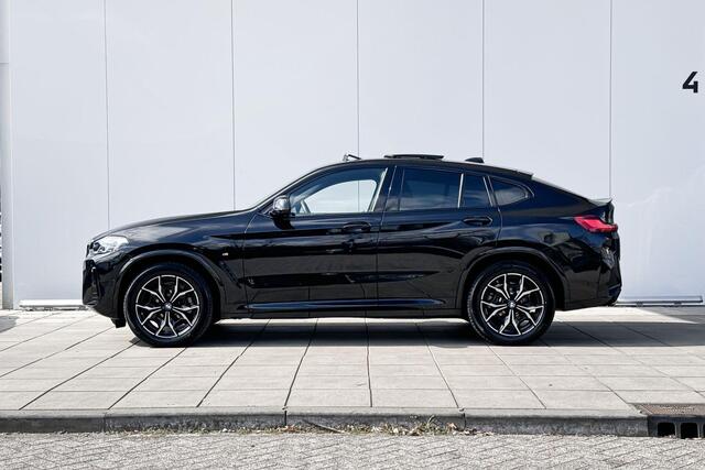 BMW X4 xDrive20i High Executive M-Sport Glazen Schuifdak / Getinte Ramen Achter / Binnen & Buitenspiegel Automatisch Dimmend / Stoelverwarming / Laser Light / Hifi