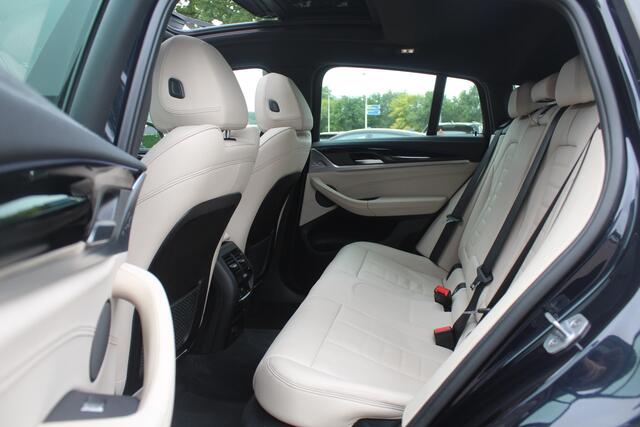 BMW X4 M40i High Executive / Trekhaak / Panoramadak / Camera / Head-up / Luxe Leder / 21'' / Harman Kardon / Navigatie / Stuur+Stoelverwarming / DAB / Dodehoek / Cruise Control