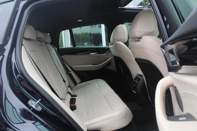 BMW X4 M40i High Executive / Trekhaak / Panoramadak / Camera / Head-up / Luxe Leder / 21'' / Harman Kardon / Navigatie / Stuur+Stoelverwarming / DAB / Dodehoek / Cruise Control