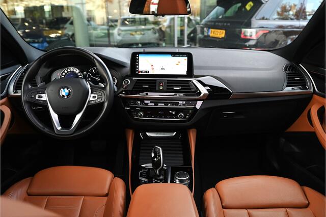BMW X4 xDrive20i High Executive xLine Automaat / Trekhaak / Panoramadak / Sportstoelen / M Sportonderstel / LED / Parking Assistant Plus / Stoelverwarming / Navigatiesysteem Professional