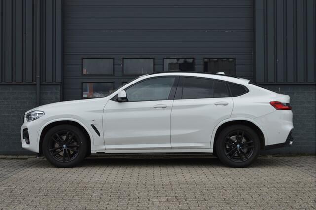 BMW X4 xDrive20i High Executive | M-PAKKET | PANO | TREKHAAK | HUD | HIFI | CAM |