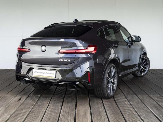 BMW X4 M40i | High Executive | M Sport Plus Pack | Macaoblauw | Stuurwielrand verwarmd | Comfort Access | Panoramadak | Head-Up Display | Harman Kardon | 21''
