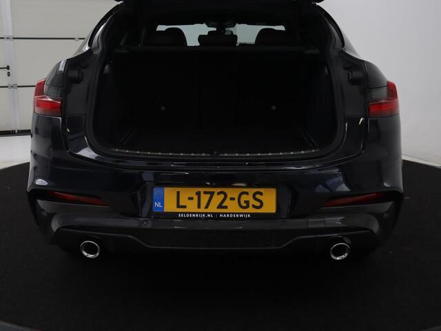 BMW X4 xDrive20i Business Edition | M-sport | Panoramadak | Leder | Memory | Stuur/stoel verwarming | Cruise control | Camera | Park assist | Carplay | Sfeerverlichting | Climate control