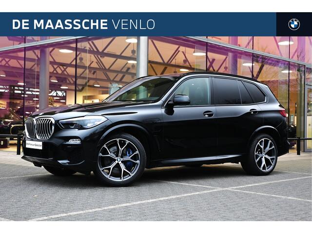 BMW X5 xDrive45e High Executive M Sport Automaat / Panoramadak / Trekhaak / Adaptive Air Suspension / Sportstoelen / Stoelverwarming / Parking Assistant / Driving Assistant Professional