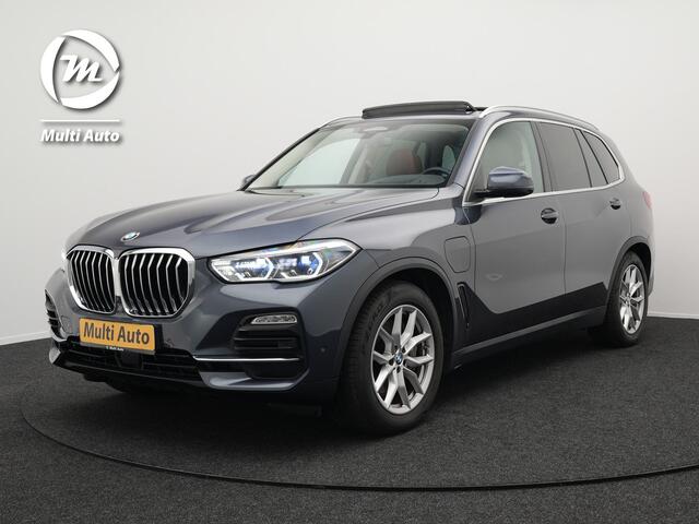 BMW X5 xDrive45e High Executive Plug In Hybrid 394pk PHEV | Panodak | Trekhaak af fabriek | Adaptive Cruise | Laser LED | 360 Camera | Head Up | Lederen Sportstoelen Memory & Ventilatie | Keyless | Sfeerverlichting |