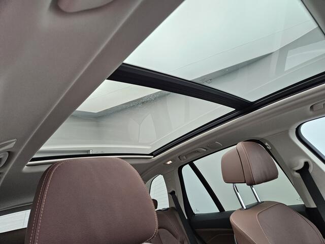 BMW X5 xDrive45e High Executive Plug In Hybrid 394pk PHEV | Panodak | Trekhaak af fabriek | Adaptive Cruise | Laser LED | 360 Camera | Head Up | Lederen Sportstoelen Memory & Ventilatie | Keyless | Sfeerverlichting |