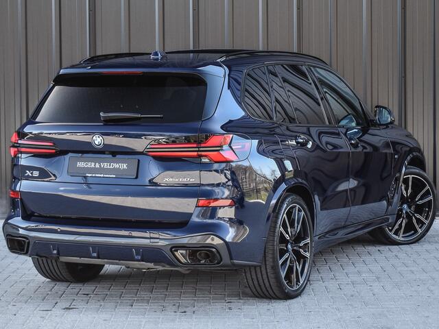 BMW X5 xDrive50e M-SPORT PRO | PANORAMADAK | M-STOELEN | ELEKTR. TREKHAAK | 360 CAMERA | HEAD UP | ALCANTARE HEMEL BEKL. | HARMAN KARDON | STOELVERWARMING V+A | AMBIANCE SFEERVERLICHTING | IONIC GLOW GRILLE