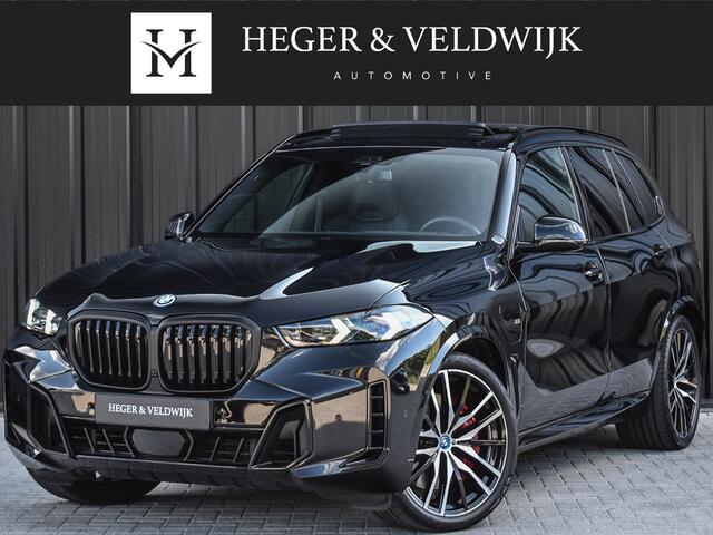 BMW X5 xDrive50e M-SPORT PRO | PANORAMADAK | CARBON INLEG | ACTIVE STEERING | M-STOELEN | MASSAGE STOELEN | STOEL VENTILATIE EN VERWARMING | HEAD UP | TREKHAAK ELEKTR. | AMBIENT AIR | DRIVING ASSISTANT PROFESSIONAL | AMBIENT SFEERVERLICHTING
