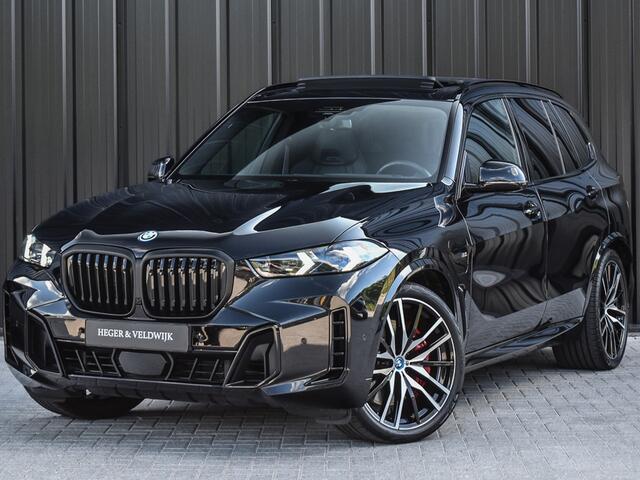 BMW X5 xDrive50e M-SPORT PRO | PANORAMADAK | CARBON INLEG | ACTIVE STEERING | M-STOELEN | MASSAGE STOELEN | STOEL VENTILATIE EN VERWARMING | HEAD UP | TREKHAAK ELEKTR. | AMBIENT AIR | DRIVING ASSISTANT PROFESSIONAL | AMBIENT SFEERVERLICHTING