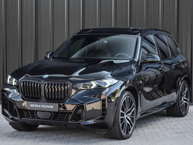 BMW X5 xDrive50e M-SPORT PRO | PANORAMADAK | CARBON INLEG | ACTIVE STEERING | M-STOELEN | MASSAGE STOELEN | STOEL VENTILATIE EN VERWARMING | HEAD UP | TREKHAAK ELEKTR. | AMBIENT AIR | DRIVING ASSISTANT PROFESSIONAL | AMBIENT SFEERVERLICHTING