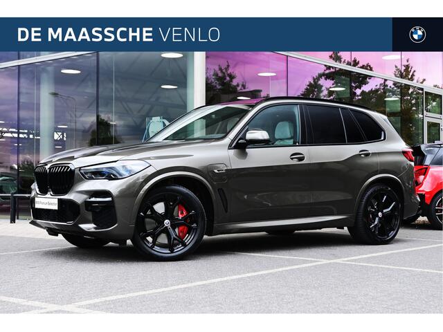 BMW X5 xDrive45e High Executive M Sport Automaat / Panoramadak / Trekhaak / Adaptief onderstel / Soft-Close / Stoelventilatie / Massagefunctie / Laserlight / Comfort Access / Head-Up / Harman Kardon