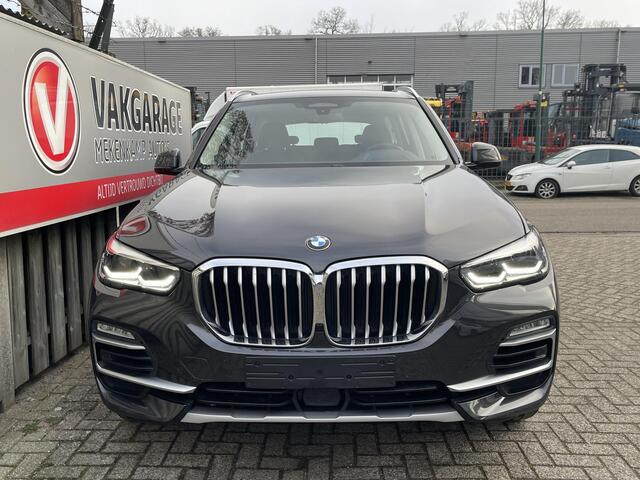 BMW X5 xDrive45e High Executive 19''/Trekhaak/Harman Kardon/Keyless/Head-up/Adaptieve cruise/Dodehoek/Stuur + stoelverwarming v+a/Luchtvering/Leder + memory
