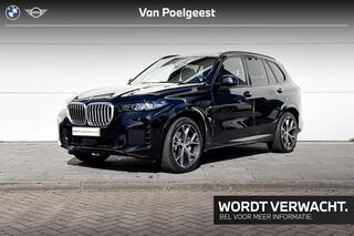 bmw-x5-xdrive50e-m-sport--driving-