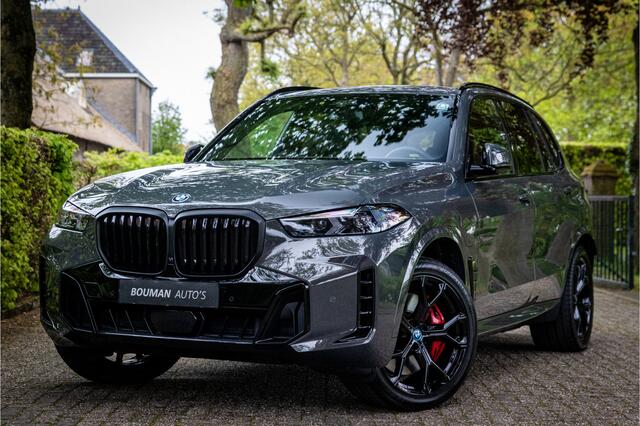 BMW X5 xDrive50e M Sport Pro Dravitgrau Individual Sky Lounge Soft Close Vierwielbesturing