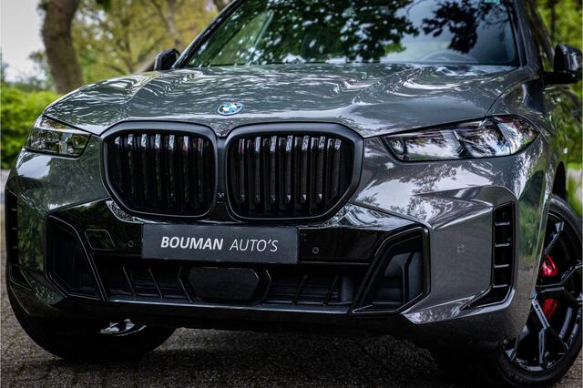 BMW X5 xDrive50e M Sport Pro Dravitgrau Individual Sky Lounge Soft Close Vierwielbesturing