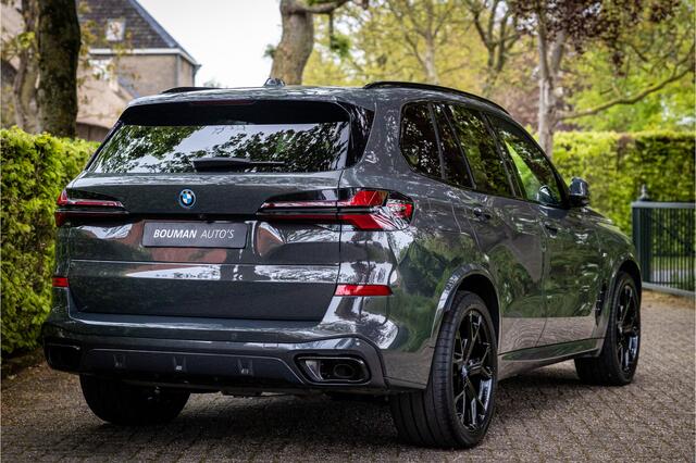 BMW X5 xDrive50e M Sport Pro Dravitgrau Individual Sky Lounge Soft Close Vierwielbesturing