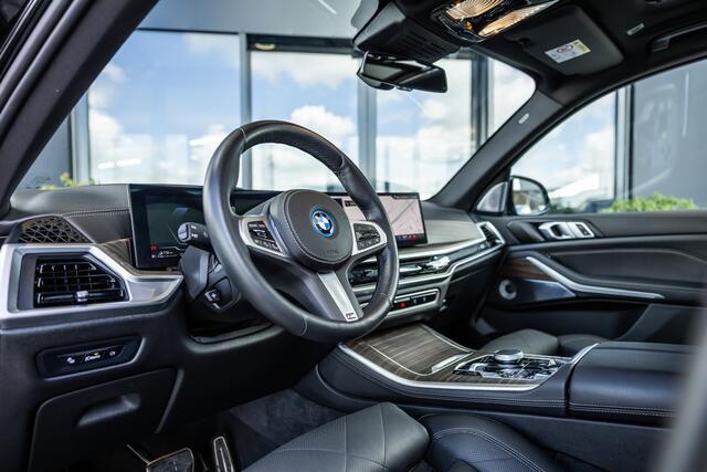 BMW X5 xDrive50e - M Sport Pro | Skylounge | B&W | Kuipstoelen | Luchtvering