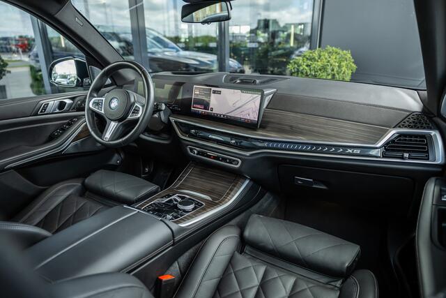 BMW X5 xDrive50e - M Sport Pro | Skylounge | B&W | Kuipstoelen | Luchtvering