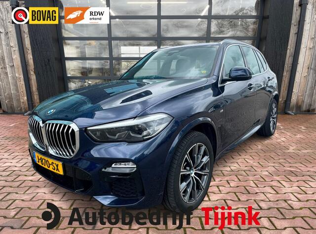 BMW X5 xDrive45e High Executive M-Sport | Luchtvering | Elek. trekhaak | Safety pack | Achterasbesturing | HUD | M aerodynamica | Leder |