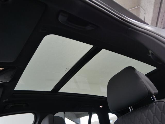 BMW X5 xDrive50e M-Sport Individual | Frozen Pure Grey | Autobahnassistent | Pano | Trekhaak | Comforzetels | Active Steering