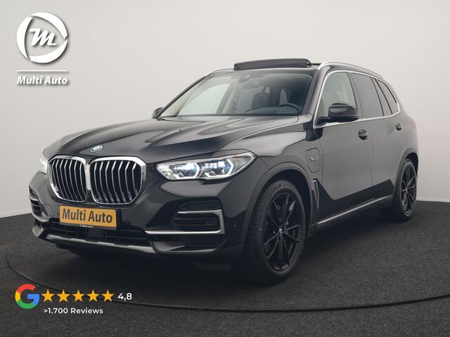 BMW X5 xDrive45e X Line PHEV 395pk Dealer O.H. | Trekhaak Af Fabriek | Panodak | Luchtvering | Head Up | Camera | Lederen Sportstoelen Memory & Verwarmd | Adaptief Onderstel | Sfeerverlichting | Keyless | Blis | Hifi | Plug In Hybrid |