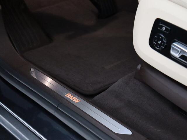 BMW X5 xDrive40i High Executive (NL-Auto / Skylounge / Luchtvering / 4Wiel sturing / 3D Camera / Stoelverw. + Koeling / Softclose / H&K / Vol!)