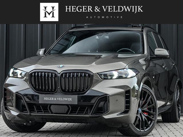 BMW X5 xDrive50e M-Sport Pro | Panoramadak | Achterasbesturing | Massage + Ventilatie | Sky Lounge | 360 Camera | Active Cruise | Harman/Kardon | Iconic Glow | BMW Gesture Control | HUD | Soft Close | Luchtvering | Trekhaak |