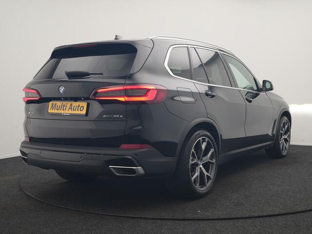 BMW X5 xDrive45e High Executive PHEV 395pk Dealer O.H. | Active Steering | Trekhaak Af Fabriek | Panodak | Luchtvering | Head Up | Adaptive Cruise | 360 Camera | Laser LED | Nappa Lederen Comfortstoelen Memory & Verwarmd | Adaptief Onderstel | Keyless | Sfeerverlichting | Apple Carplay | 21"L.M | Plug In Hybrid |